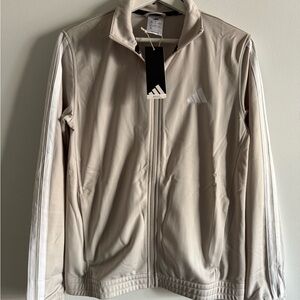 Adidas women’s Beige Tracksuit Jacket with two side zipper pockets